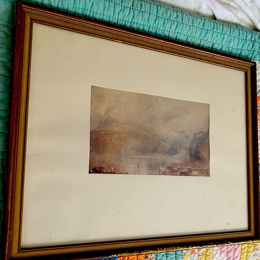 An antique landscape shabby chic painting